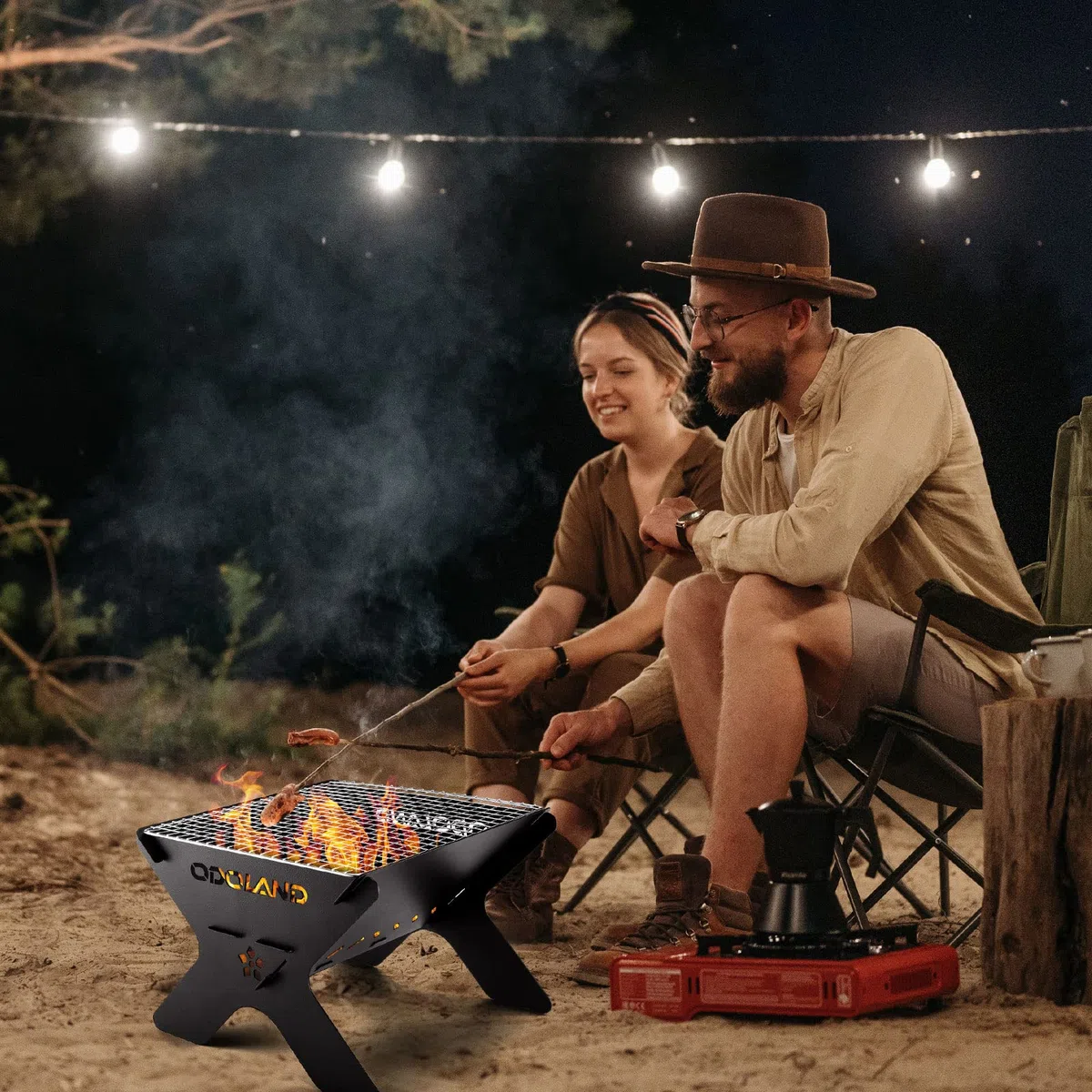 Odoland Camping Fire Pit, Portable Brasero Extérieur pour Camping, Barbecue à Foyer en Bois 2 en 1 avec Grille de Cuisson Amovible pour Barbecue en Plein Air, avec Sac de Transport